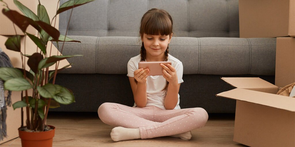 a child playing mobile games