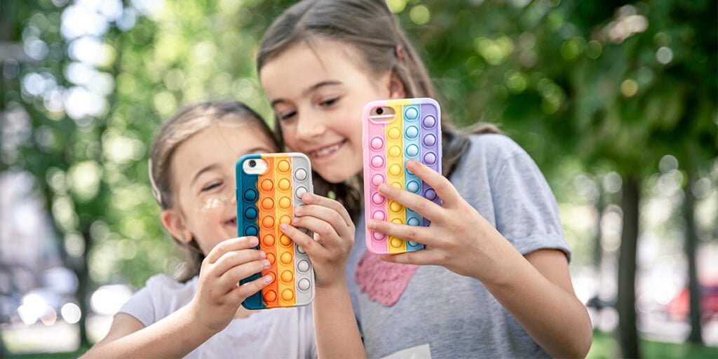 kids playing with their google pixel phones