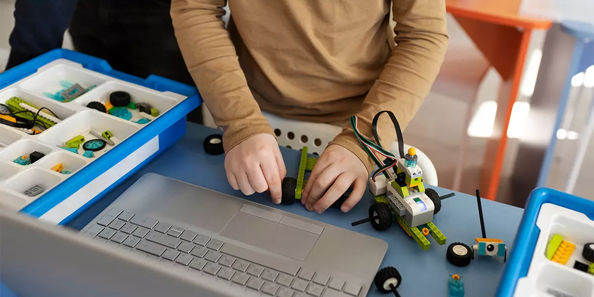 Children are encouraged to learn coding when they can use it to play with a robot