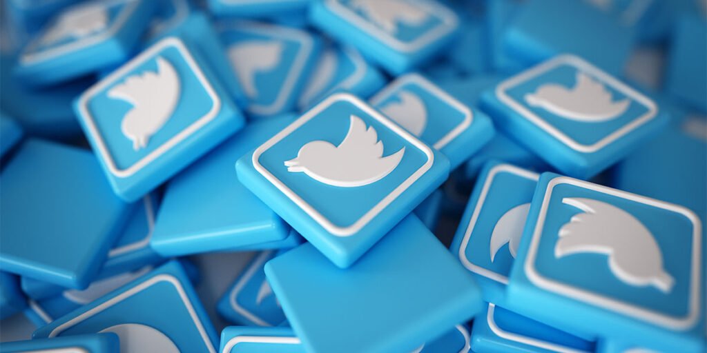 3D illustration of a pile of Twitter logos