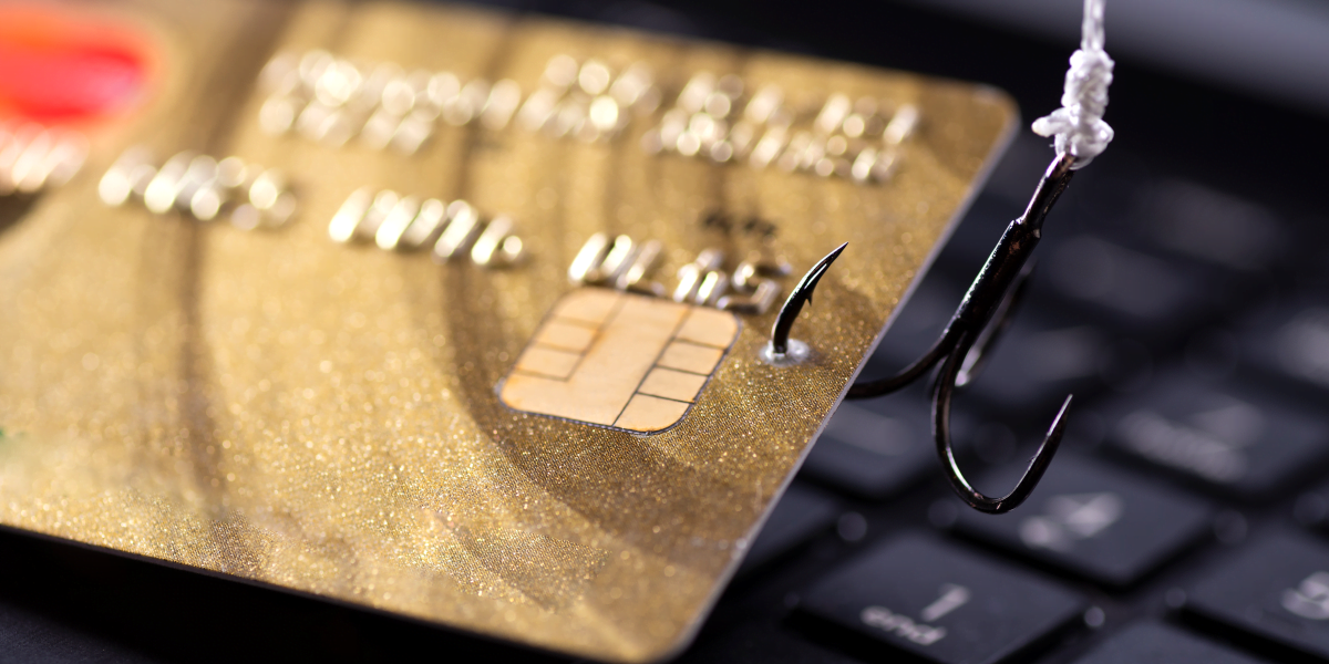 Fishing a credit card from above a keyboard