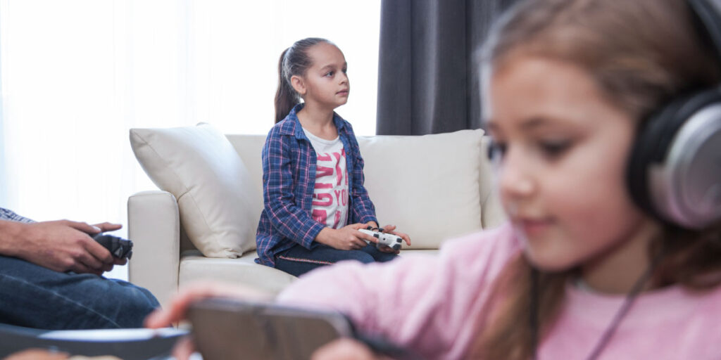 A child playing with a console