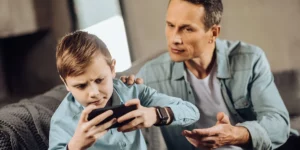 Father trying to take away son’s phone