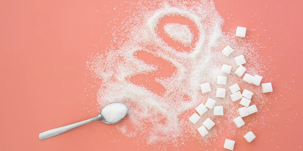 NO is written with sugar and sugar cubes next to it