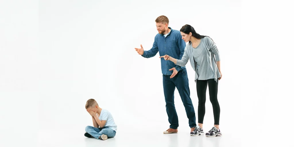 Angry parents scolding their son