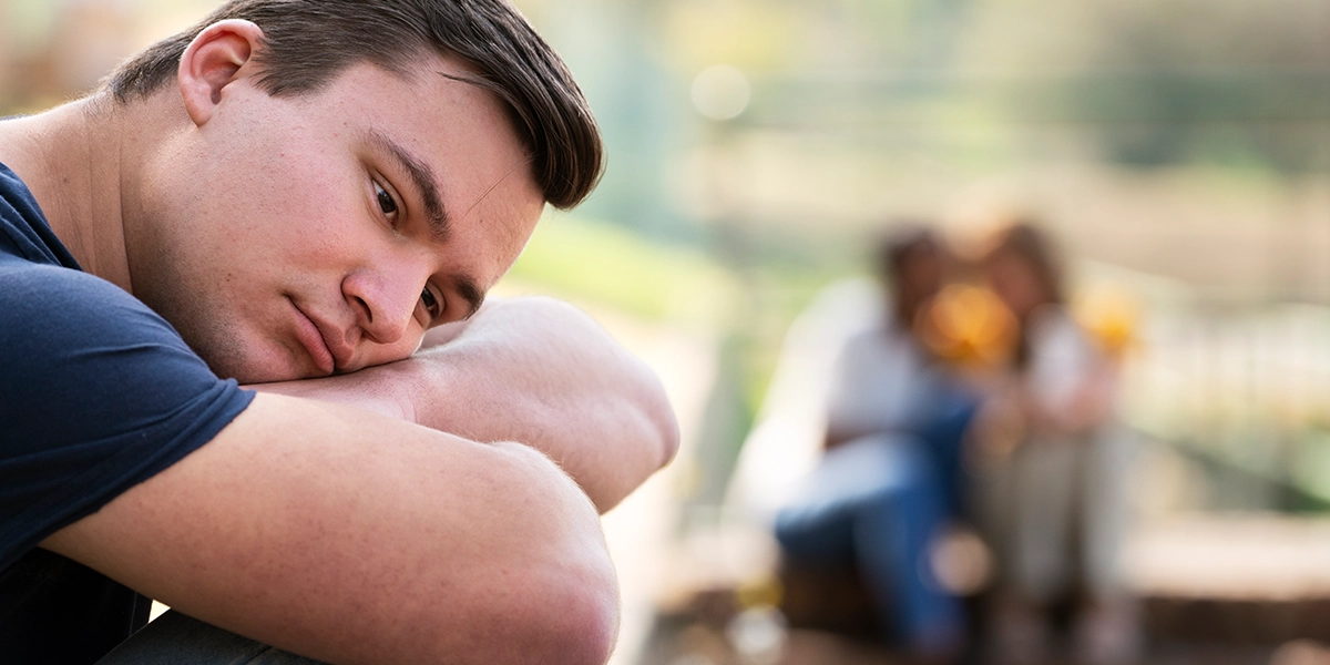 teen boy in his own thoughts with anxious facial expression