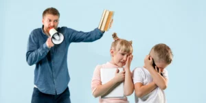 Father scolding his daughter and son