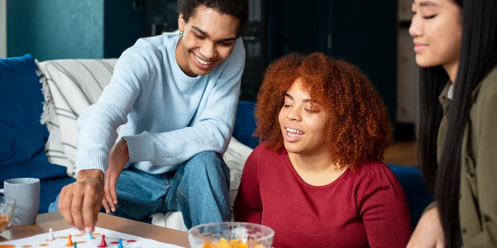 Family playing a board game together