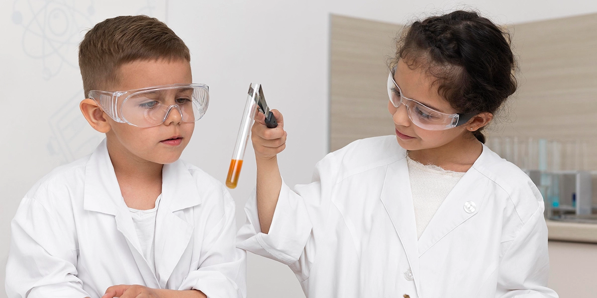 boy and girl doing scientific experiment