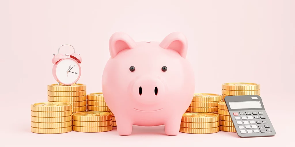 Piggy bank, books, and saving money