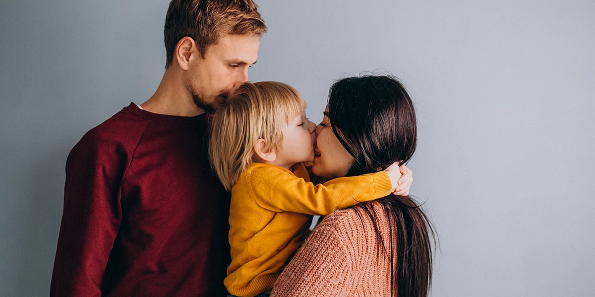 Parents loving their well behaving child