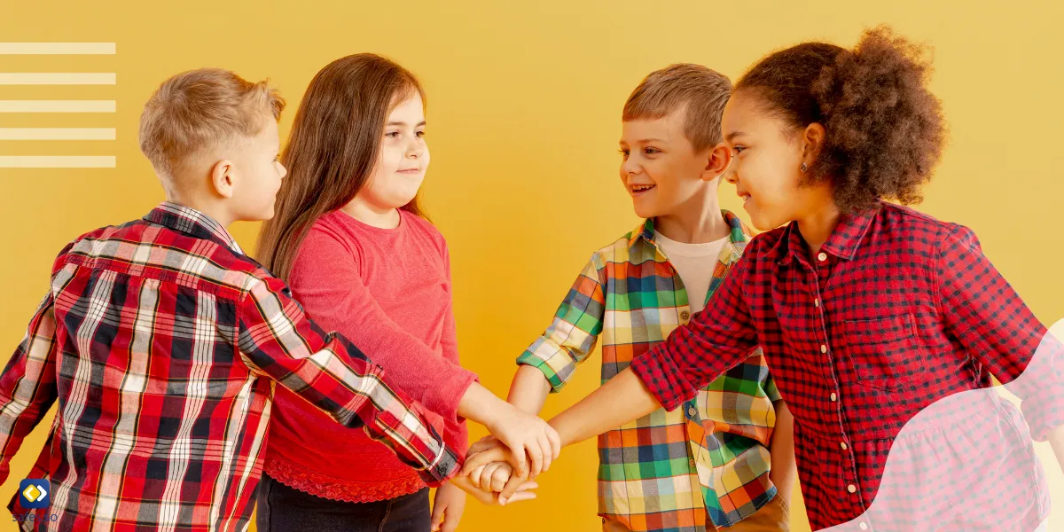 vier Kinder beim Händeschütteln