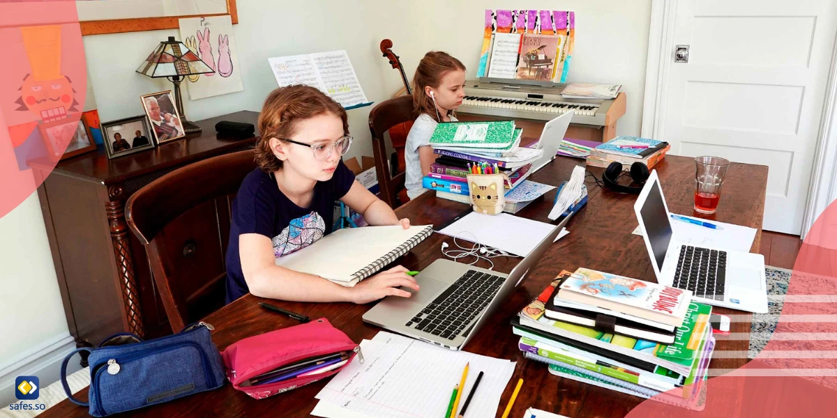 Two children using homeschooling programs with their laptops at home