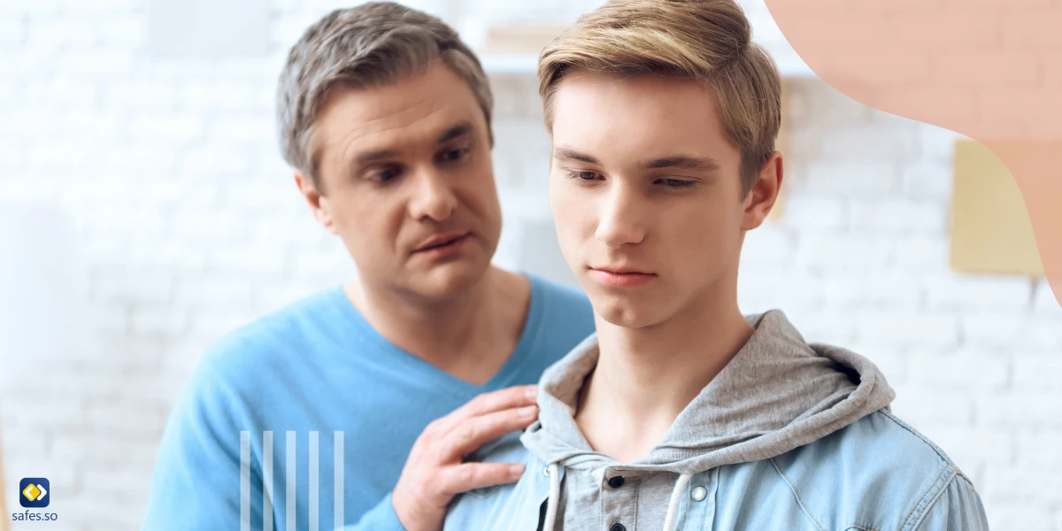 Father trying to have a conversation with his teenage son who is irritated about a sensitive topic
