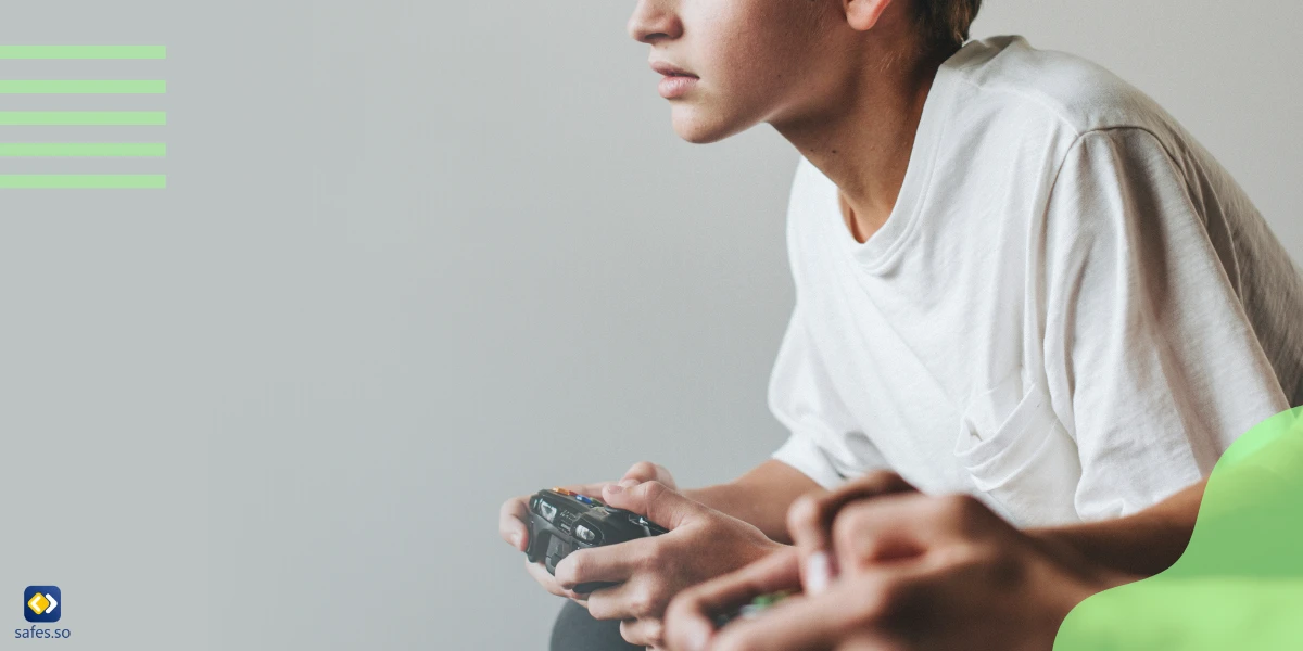 Close up of two teenage boys playing video games
