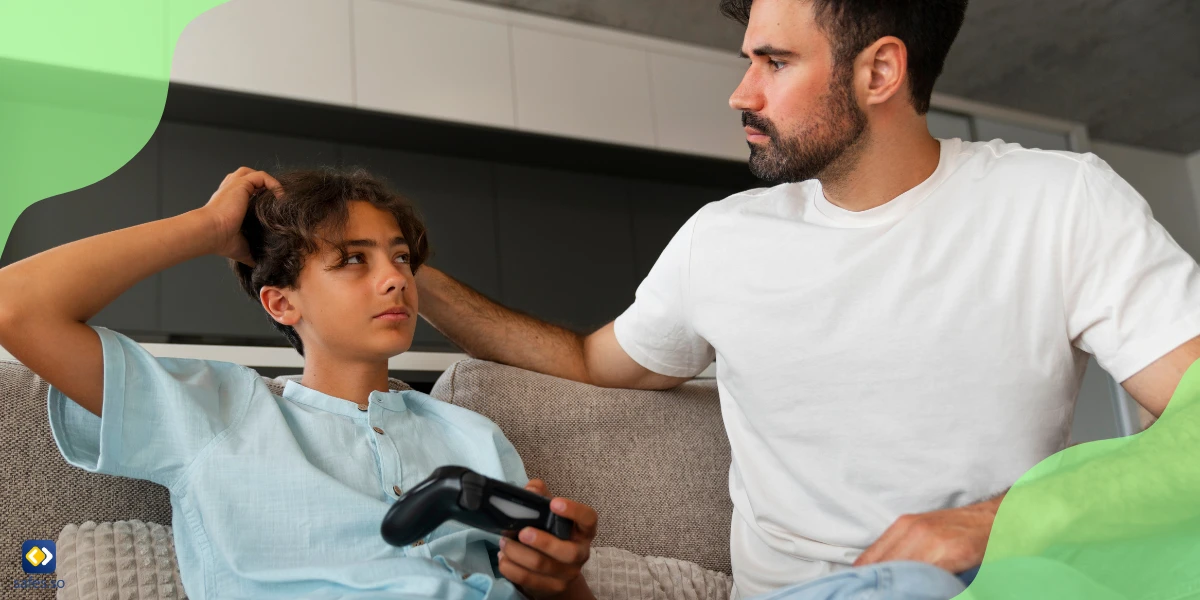 Father advising his teenage child to foster positive behavior when playing video games