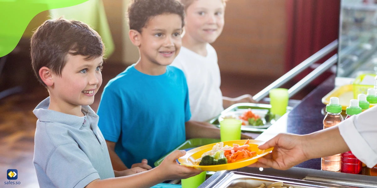 Children eating healthy food at school