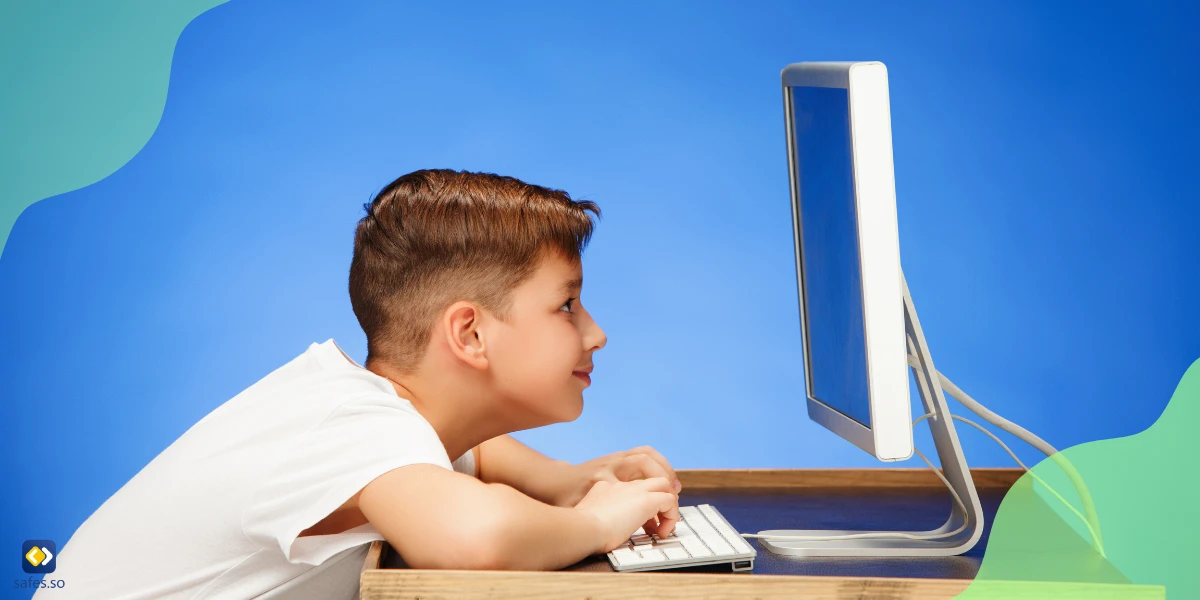 Child using a computer with a forward head posture