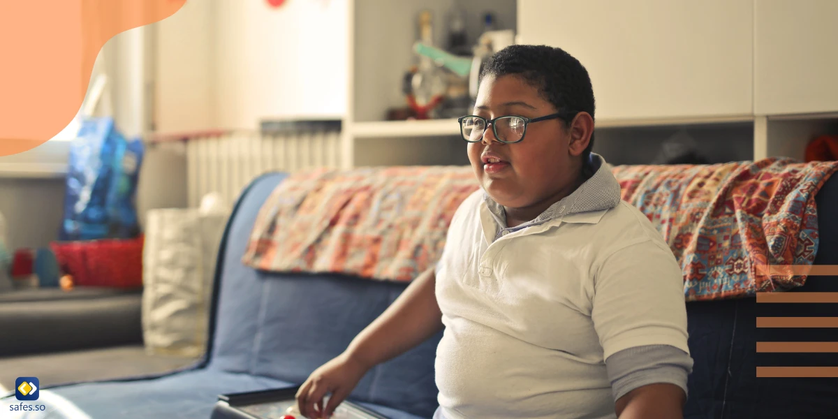 Obese child sitting on a couch