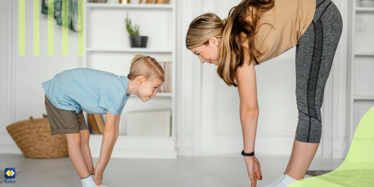 Mother and son working out together, stretching their hip flexor muscles