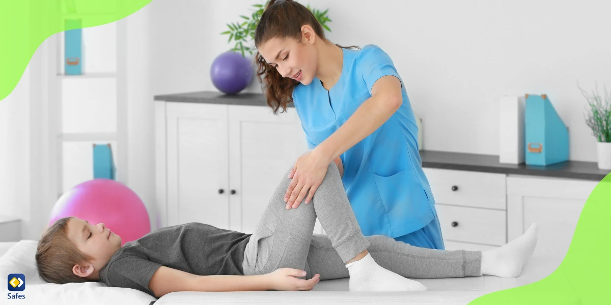 Physiotherapist working on a kid’s hip flexors in a clinic