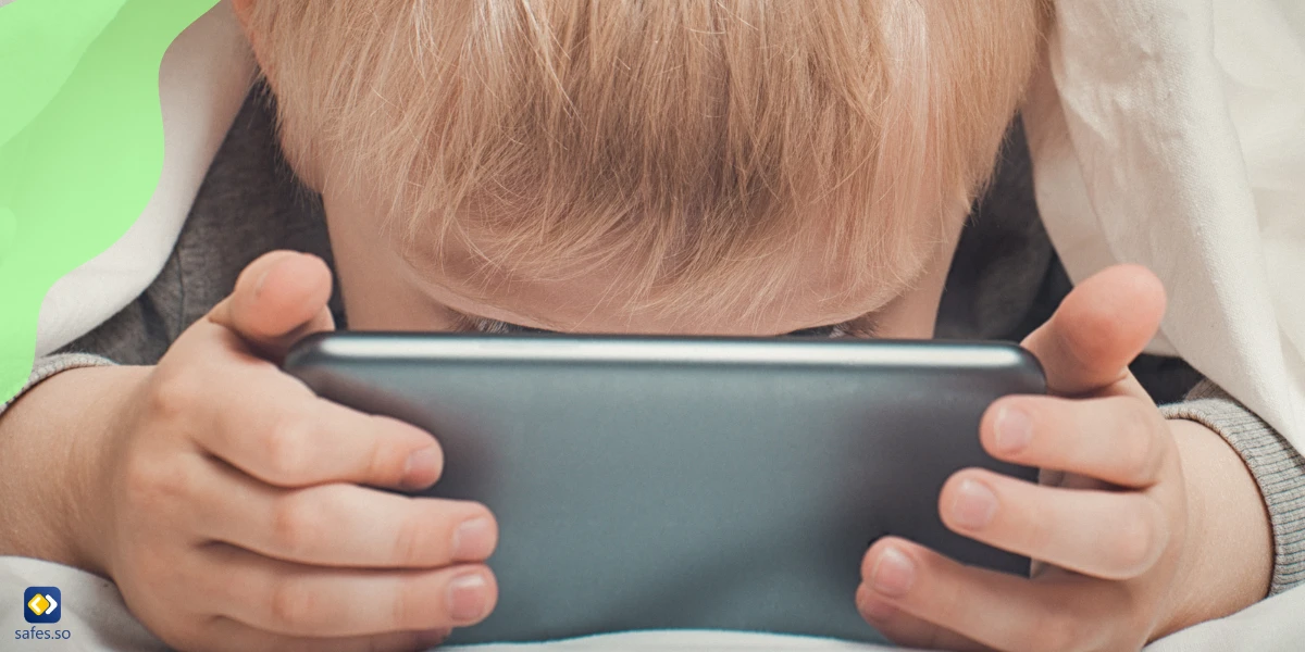 Child hooked on his smartphone screen