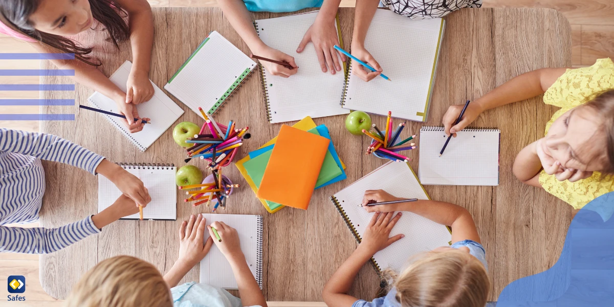 Students writing on notebooks