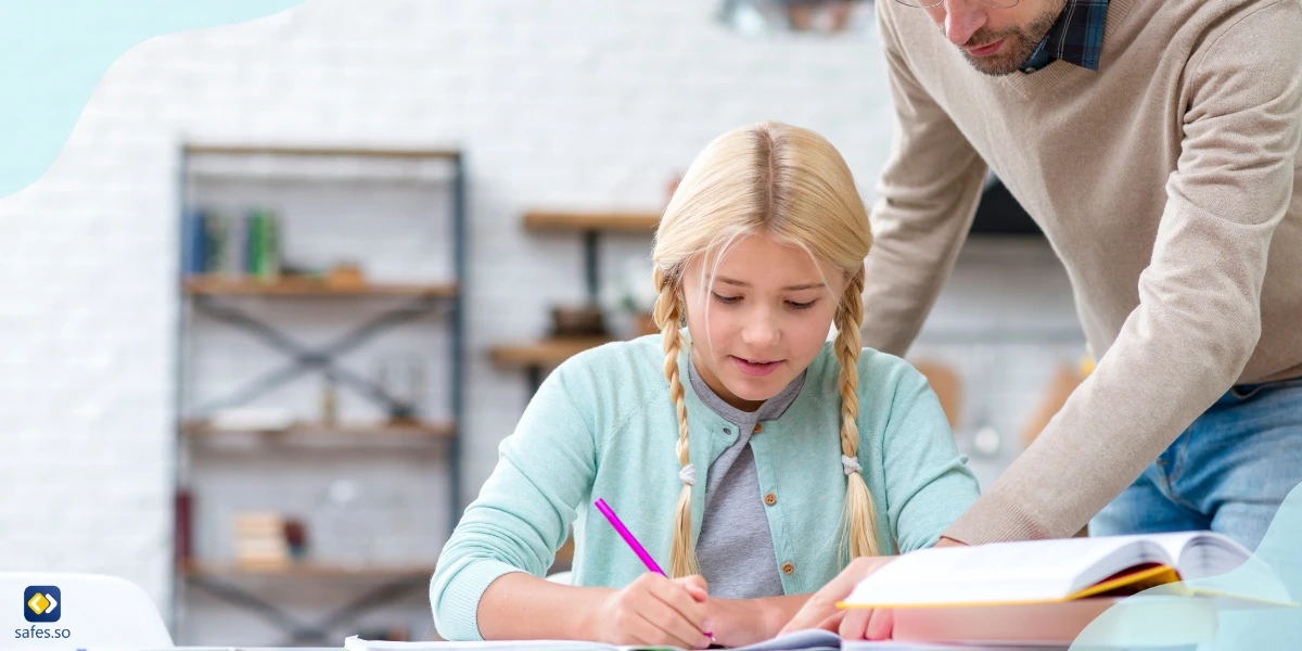 Father teaching child at home