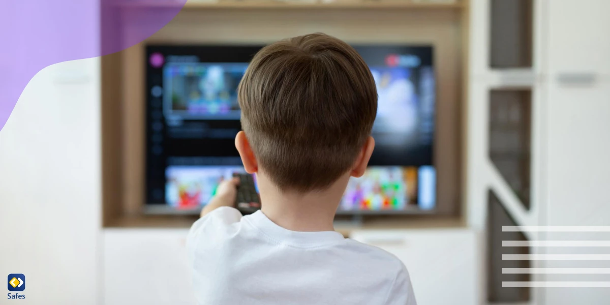 Little boy watching a streaming service alone at home