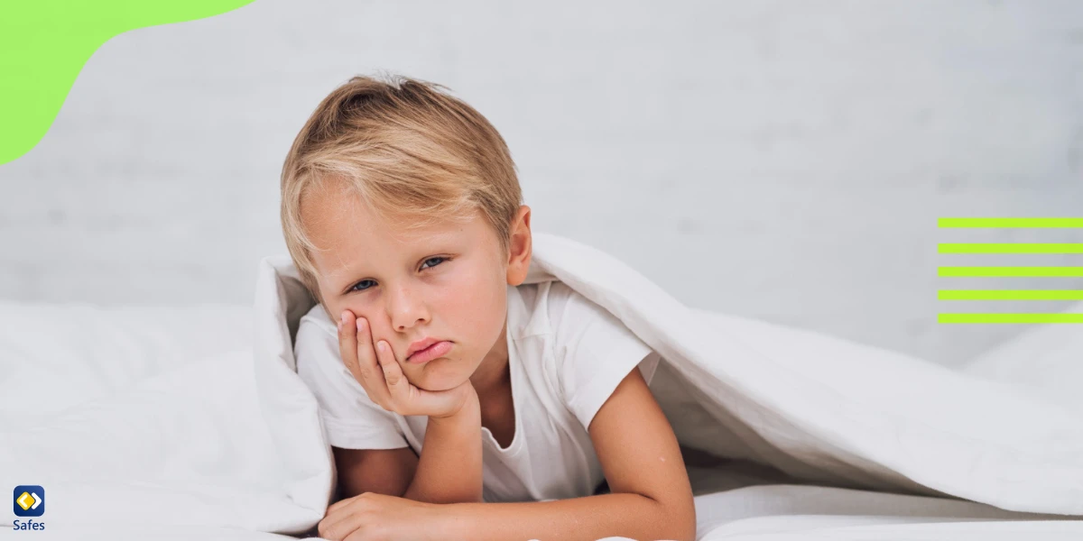 A small girl has wet her bed