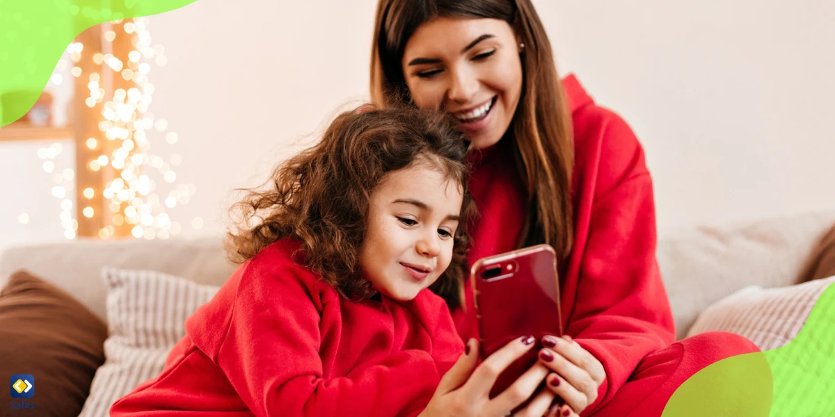 Mother and daughter looking at phone