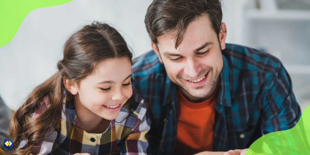 Father encouraging her daughter to read instead of using a phone as a means to protect her from nomophobia