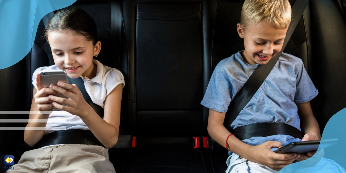 Two children watching microlearning courses in the car