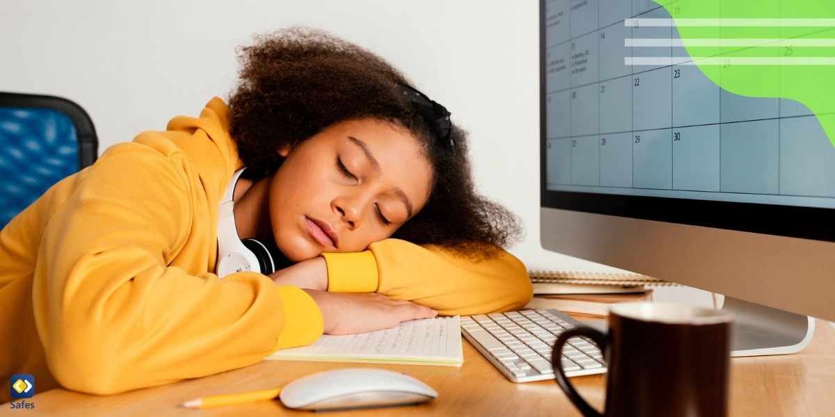 A teenage girl is sleeping on desk