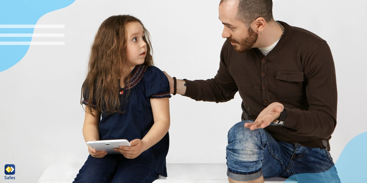 Father teaching his daughter the importance of accepting constructive criticism