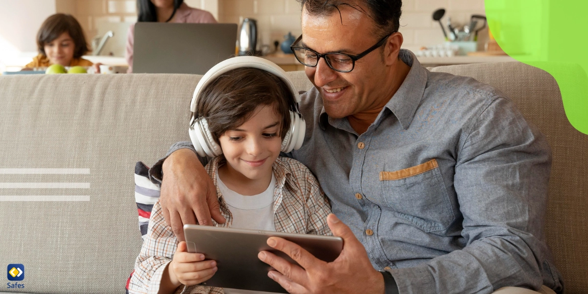 child and father using phone and mother and boy using laptop in the background