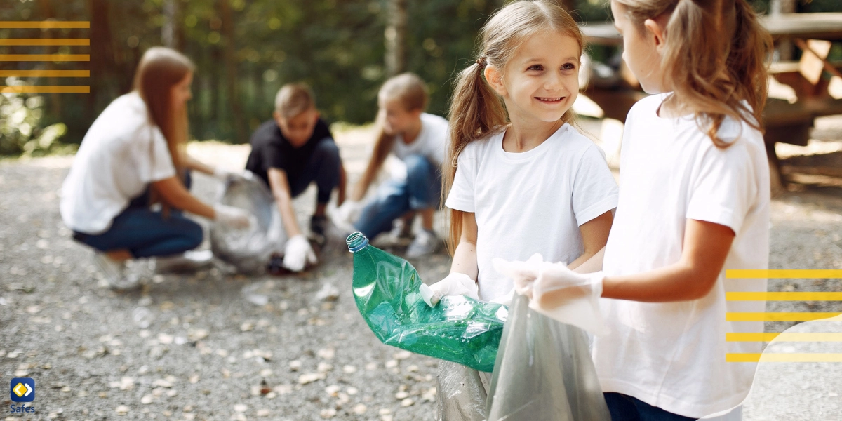 A group of children collecting garbage in a park
