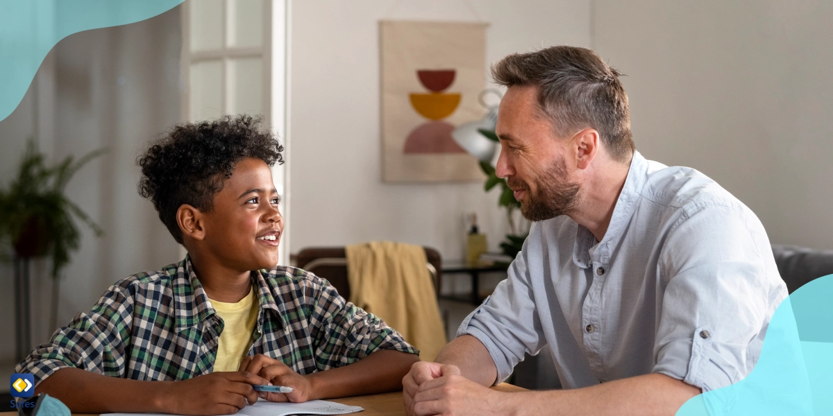 This father is actively engaged in his son’s homework and school experience.