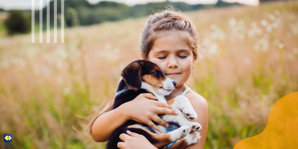 Child feeling good because she is hugging a puppy. She is obviously not cruel to animals and doesn’t abuse them.
