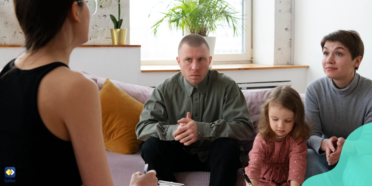 Parents attending a children’s therapy session with their daughter
