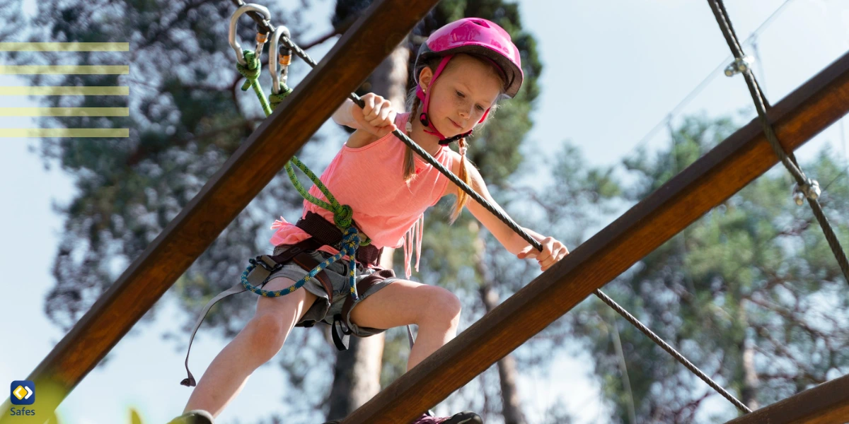 A girl having fun at an obstacle course.