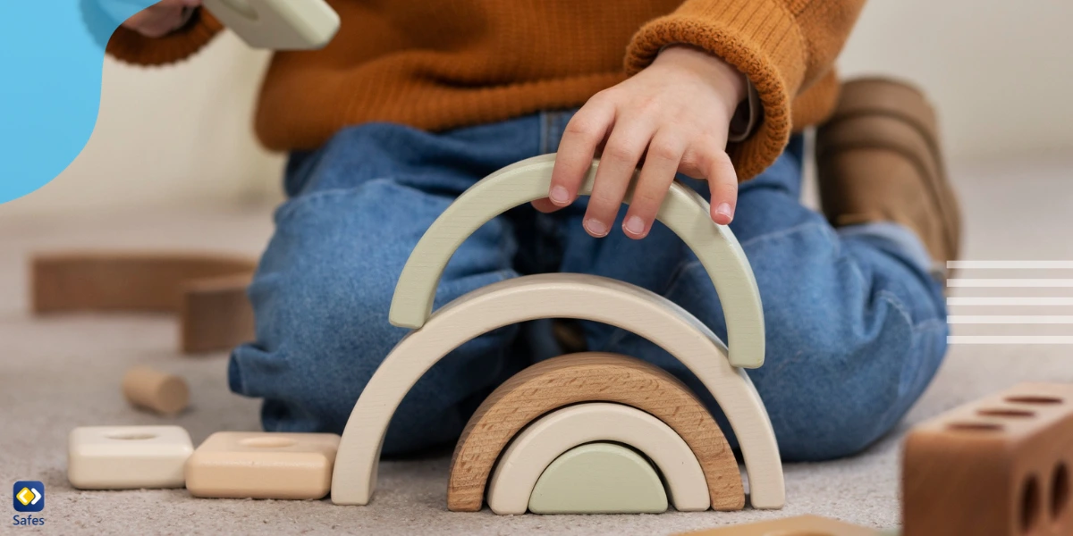 Child playing with Montessori toys and being educated with Montessori method