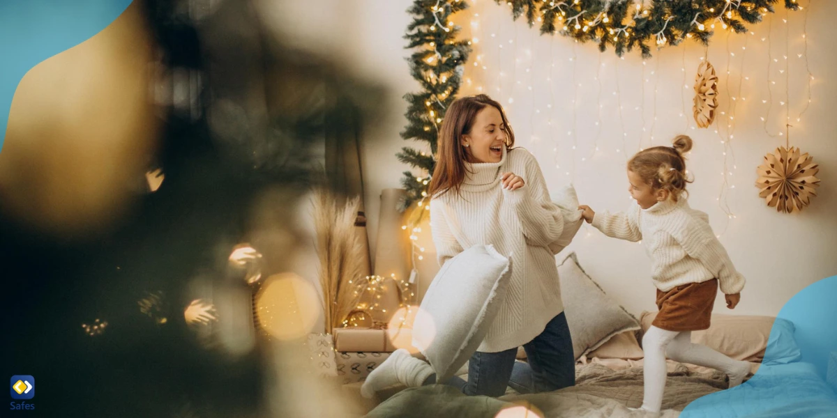 A mother and daughter playing games in a Christmas-decorated house.