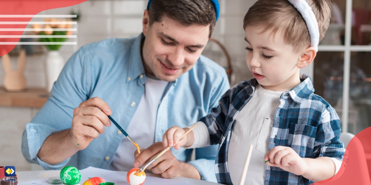 Vater zeichnet mit seinem Sohn