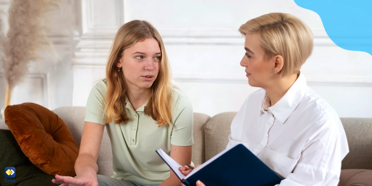 A high school girl talking to a therapist about her school problems.