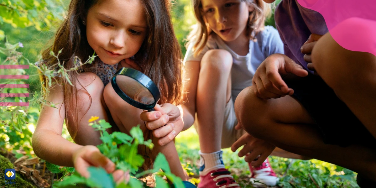 Mädchen erkunden die Natur und lernen etwas über die Pflanzen.