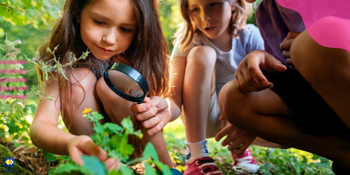 Girls exploring nature and learning about the plants.