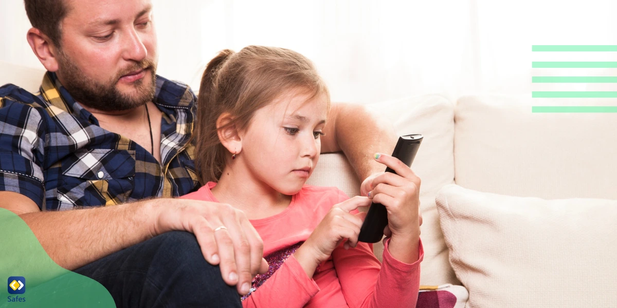 Parent monitoring her child playing online games with chat feature