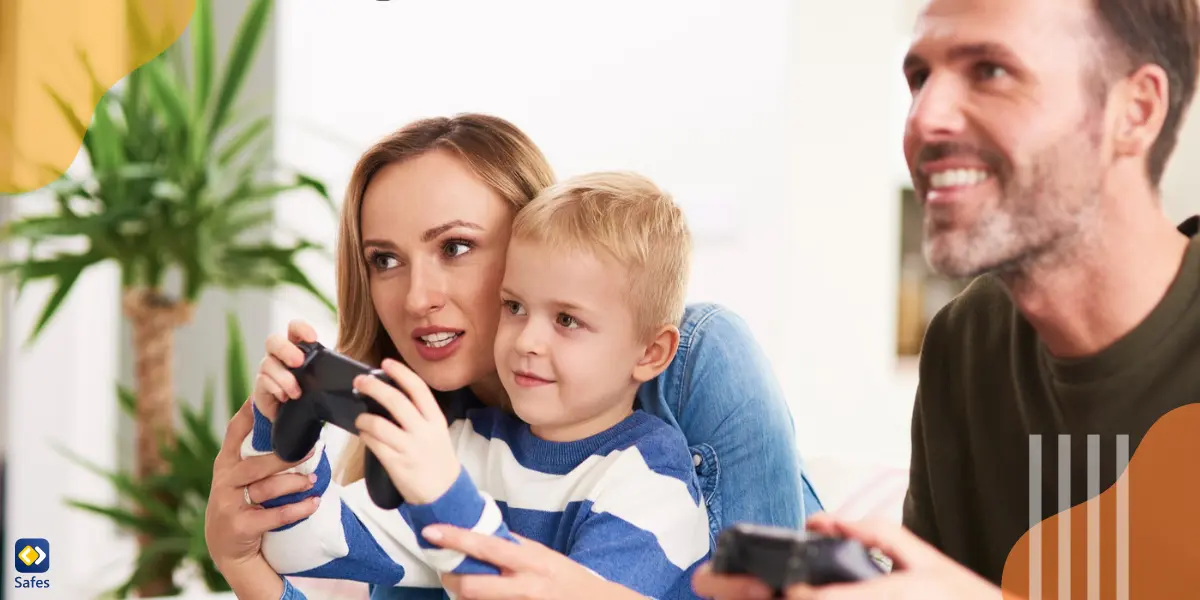 ein kleiner Junge, der mit seinen Eltern Videospiele spielt