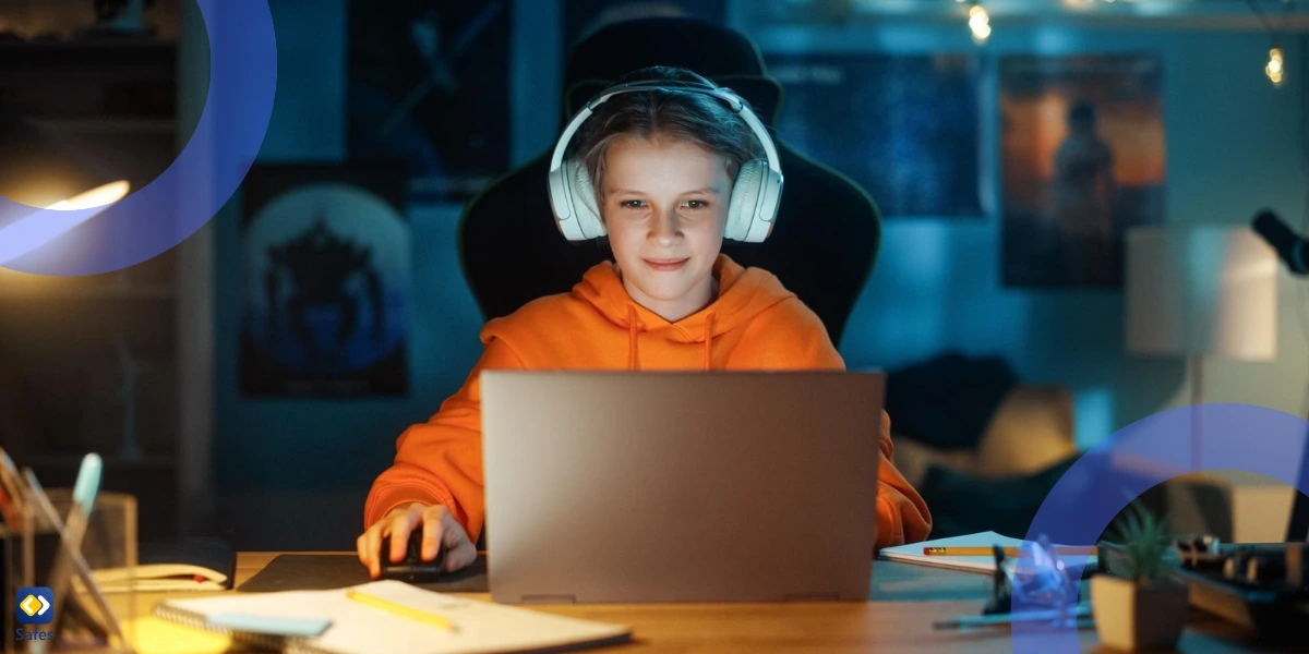 boy with headphones Using Laptop